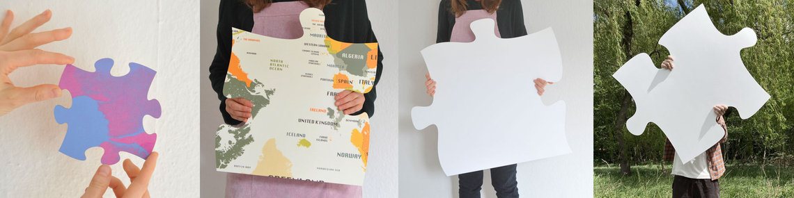 Bedruckte und unbedruckte Puzzleteile in allen Größen.